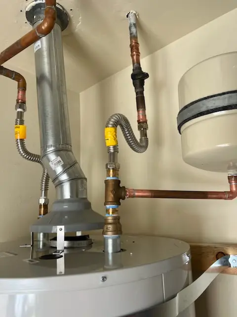Water heater installation and plumbing repair in Northeast Community